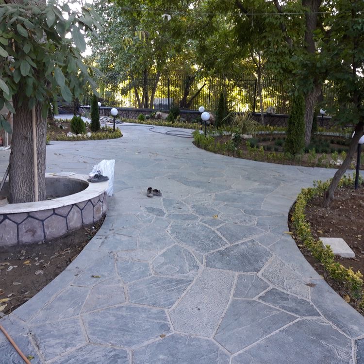 نصب سنگ لاشه و اجرای سنگ لاشه برای کف سازی و باغچه سازی محوطه سازی باغ ویلا با استفاده از سنگ لاشه نصب و اجرا شده است 